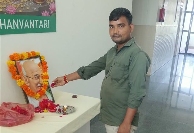 Offering flowers in tribute