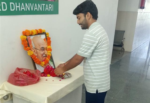 Staff pay floral tribute