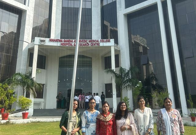 Faculty members at the flag hoisting
