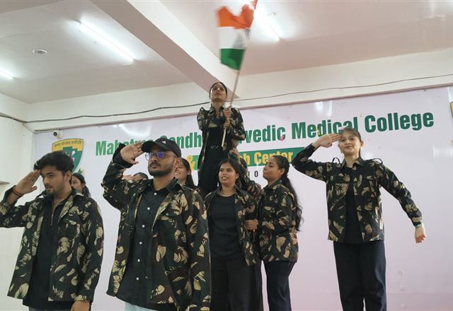 Students salute the tricolour